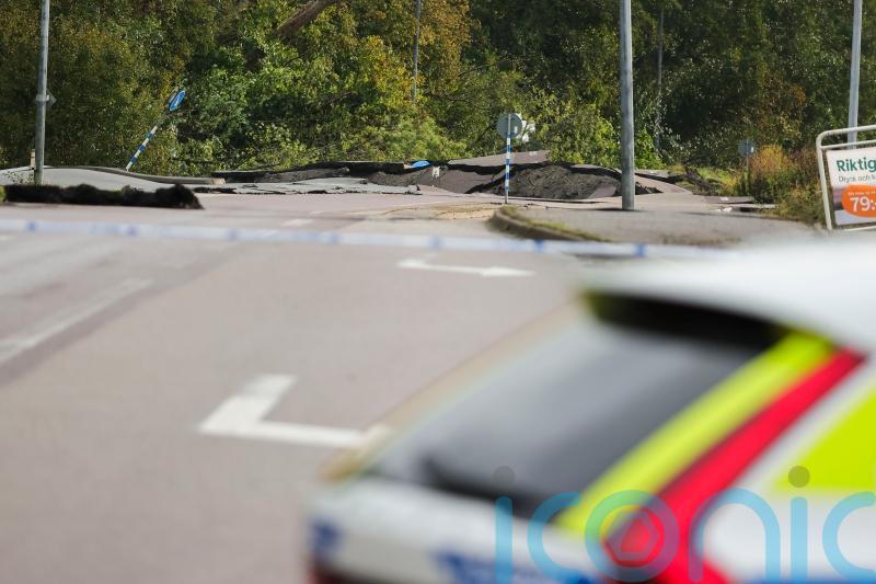 Three injured after landslide in Sweden causes huge sinkhole on highway