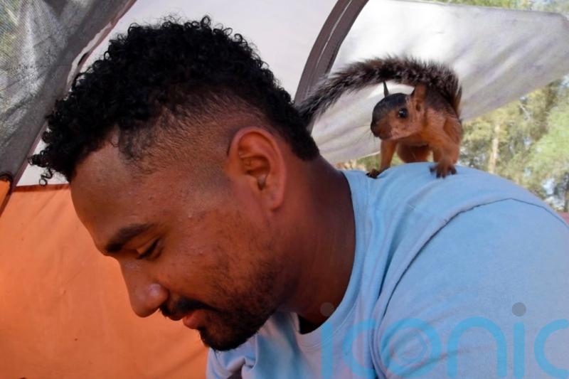 Venezuelan faces having to part with pet squirrel after making it to US border