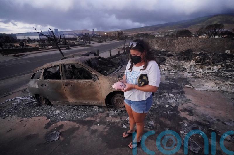Lahaina residents begin returning to sites of homes destroyed by deadly wildfire