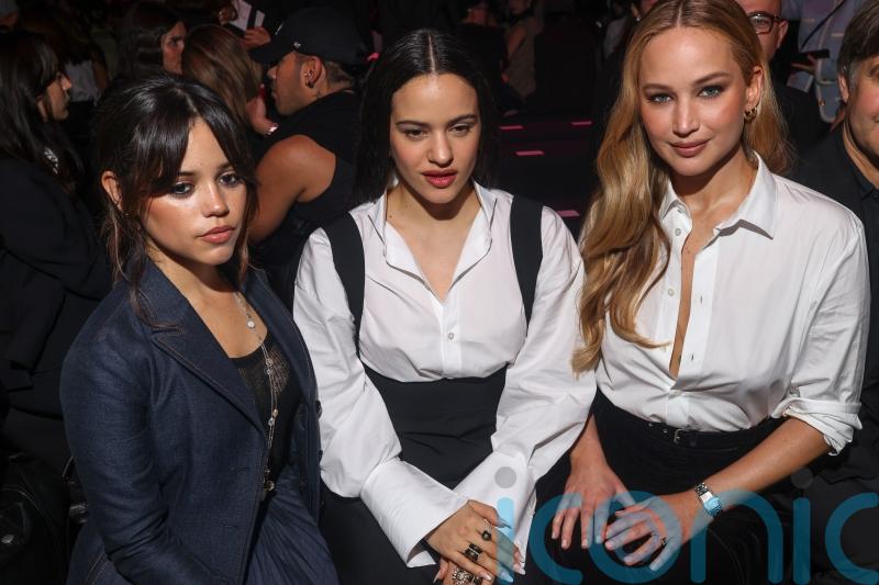 Jennifer Lawrence and Charlize Theron dazzle at feminist-themed Dior show