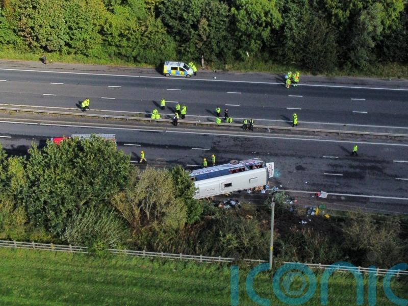 Girl, 14, and school bus driver die following motorway crash