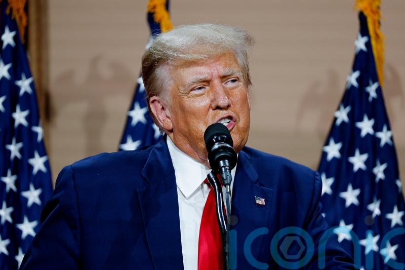 Donald Trump says he will be in court for trial over his business practices