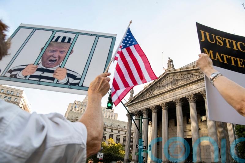 Donald Trump arrives in court for trial scrutinising his business practices