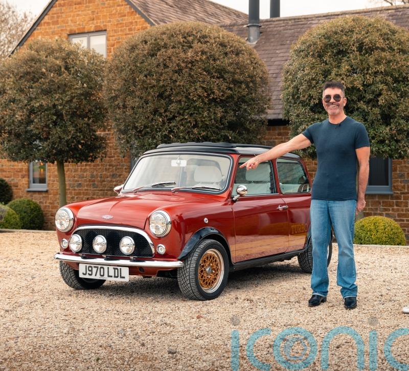 Simon Cowell takes delivery of classic electric Mini