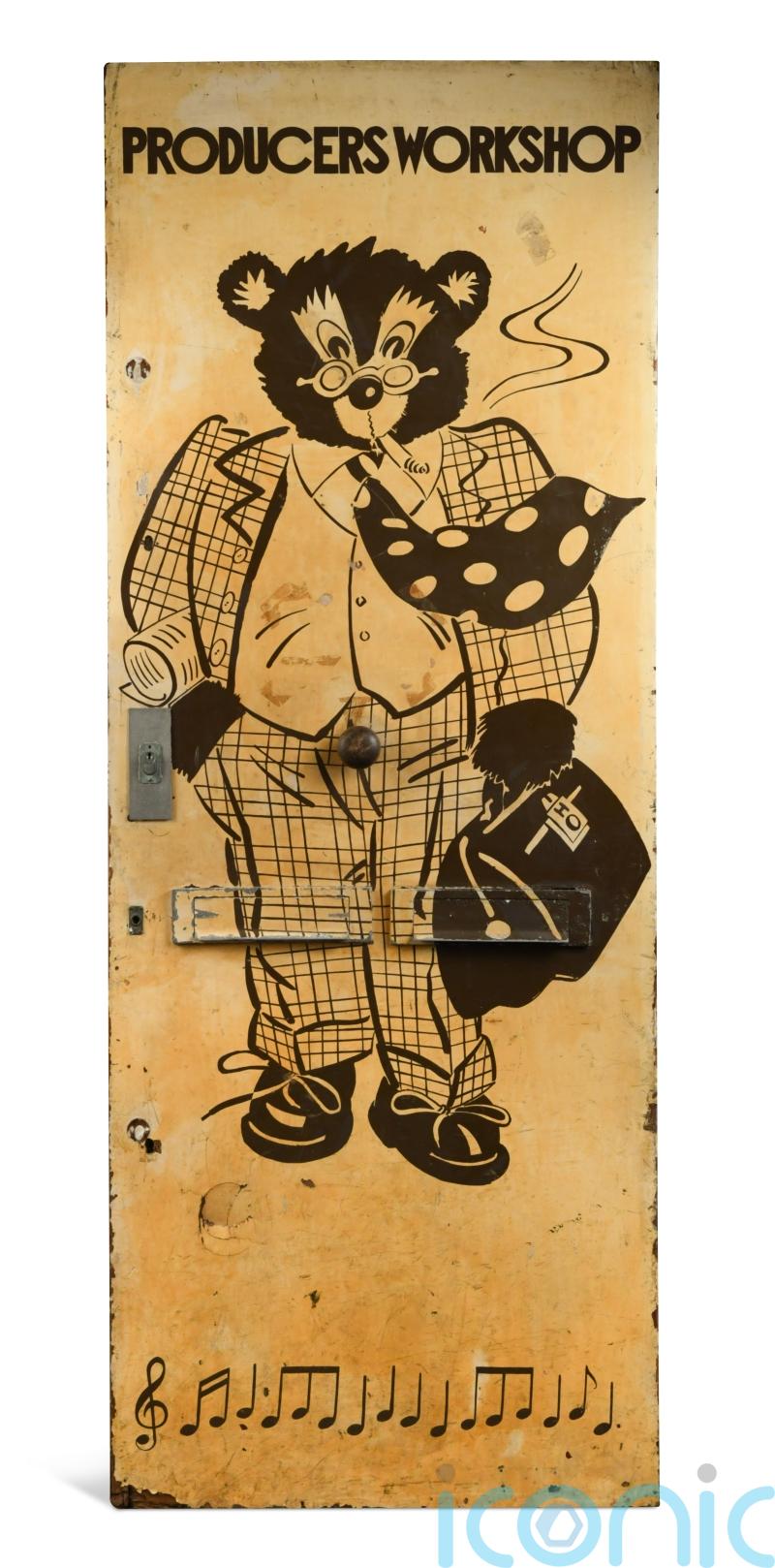 Music studio door painted with smoking teddy bear artwork to be sold at auction