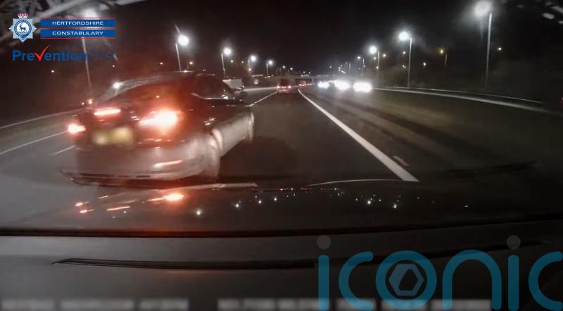 Video shows driver losing control and swerving across M25 before crashing twice