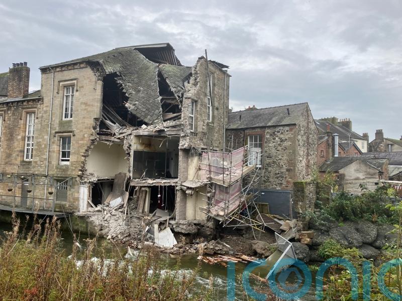 Part of historic Old Courthouse in Cockermouth collapses into river