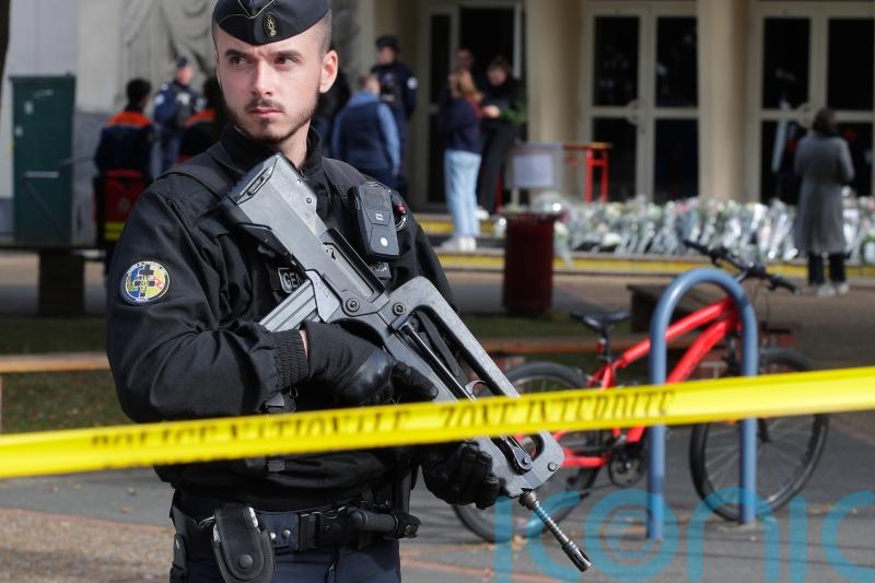 Macron holds security meeting with France on high alert after school stabbing