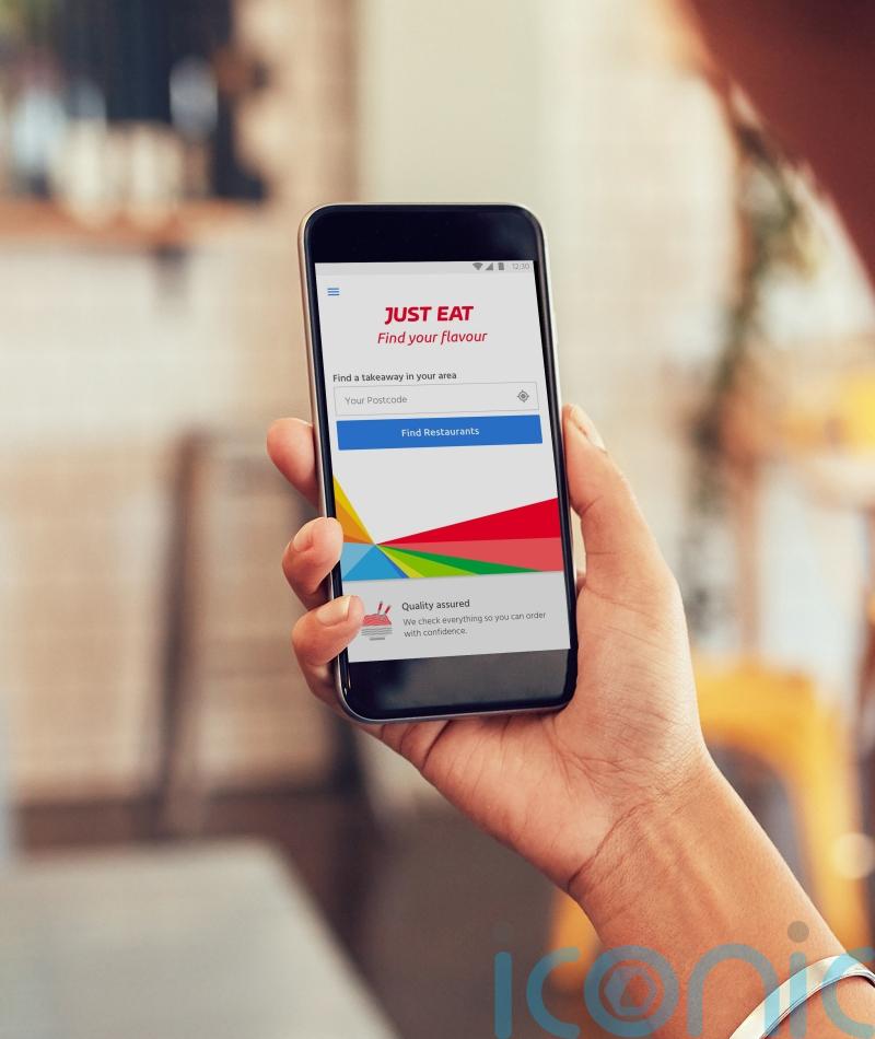 Just Eat raises earnings outlook as UK sales return to growth