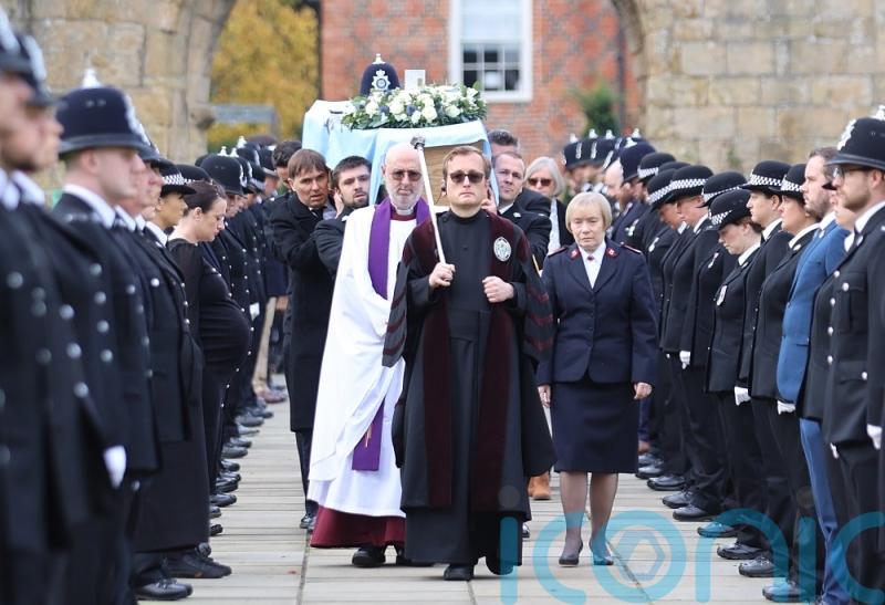 Funeral held for police officer who died after being hit by a train