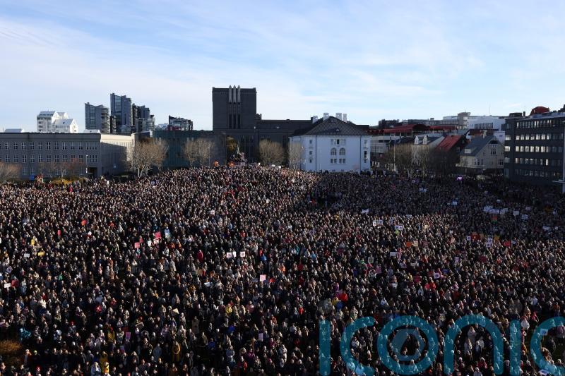 Women in Iceland including PM go on strike for equal pay and an end to violence