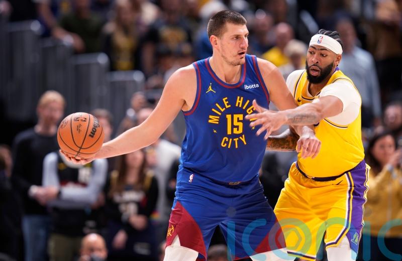 Denver Nuggets open NBA season with 119-107 win over Los Angeles Lakers