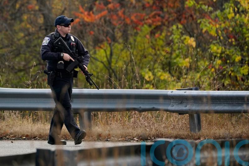 Maine police widen search for gunman after 18 killed at bowling alley and bar