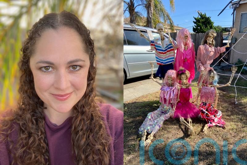 Mum creates Barbie Halloween house with a hearse, pink caskets, and a guillotine which her daughter wants to operate
