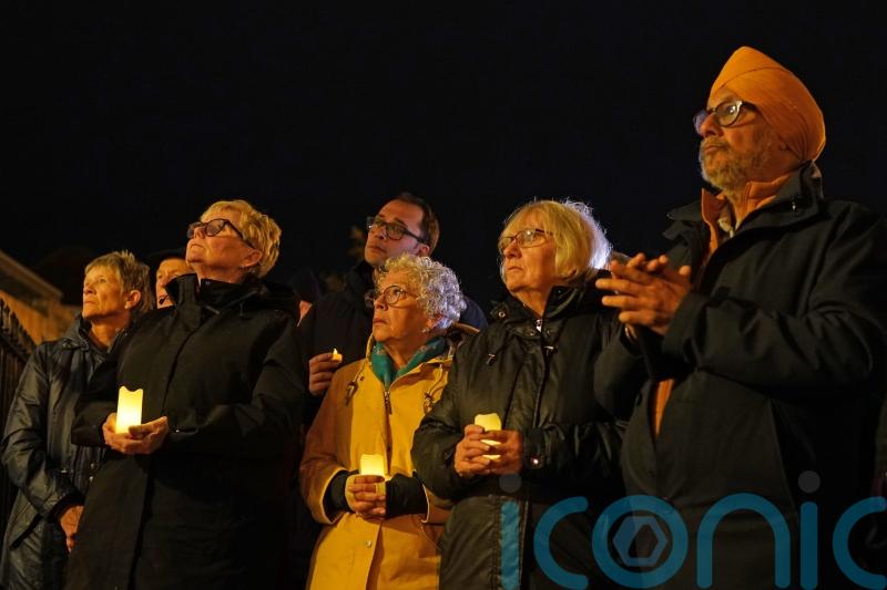 Candle-lit cathedral vigil calls for ‘human solidarity’ amid conflict