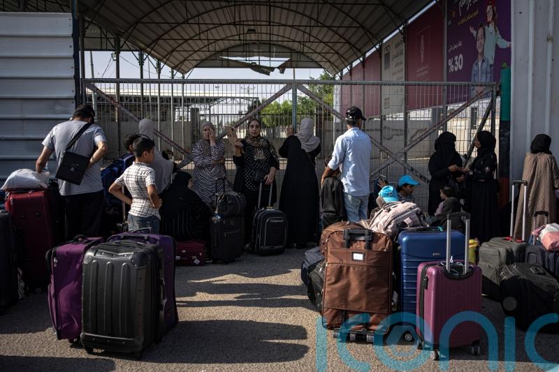 Ministers trying to secure release of more Britons as two aid workers flee Gaza