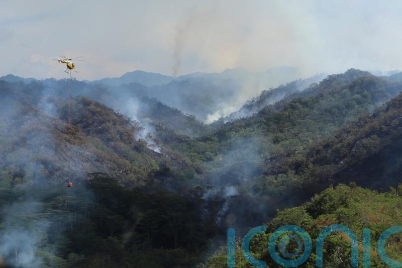 Hawaii firefighters continue to battle wildfire in mountainous Oahu