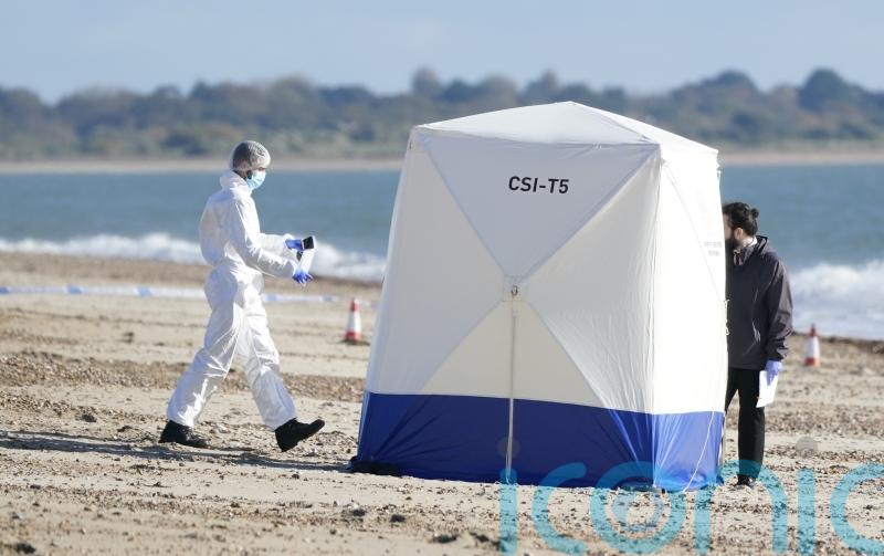 Man whose body was found on beach has been identified, police say