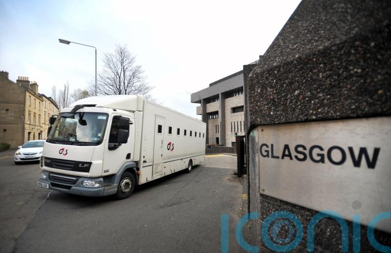 Man to face court after death of 23-year-old in block of flats