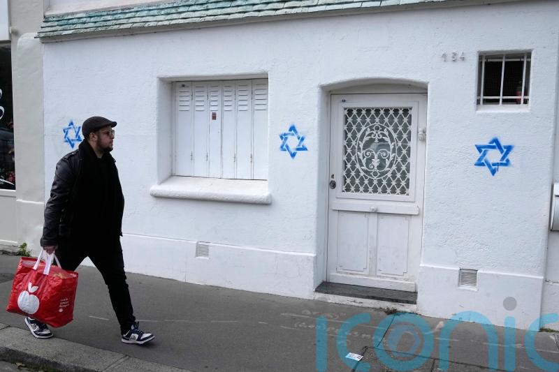 France blames Russia over bot campaign linked to antisemitic graffiti