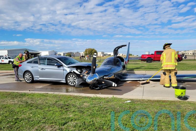 Small plane crashes into car after overshooting runway during emergency landing