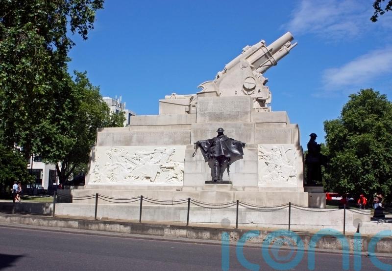 Police say no laws broken as protesters climb on war memorial