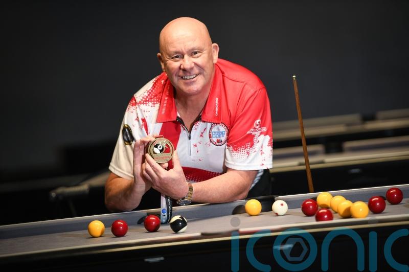 Lottery winner who bought pool table before representing England wins bronze