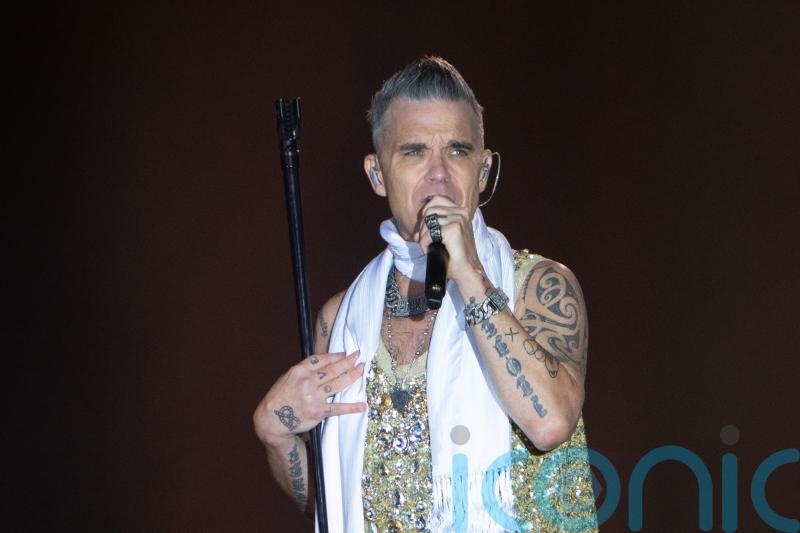 Robbie Williams fan dies after falling at his Sydney show
