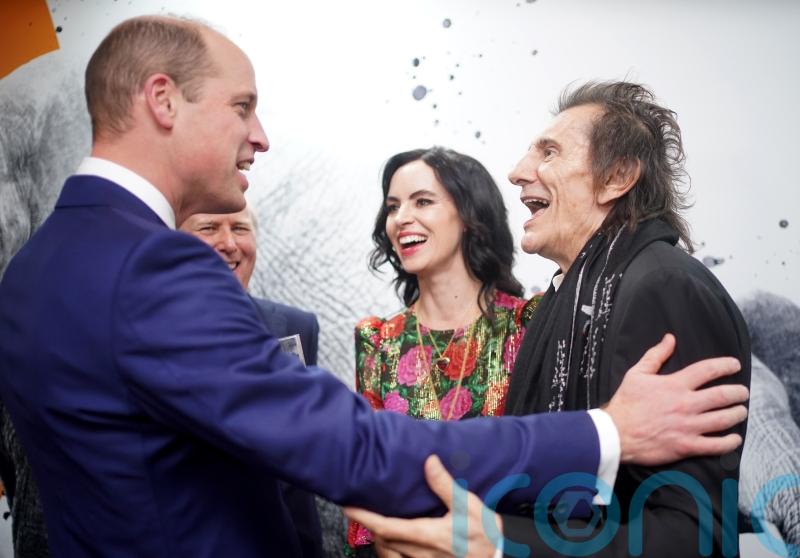 Ronnie Wood tempts William with Rolling Stones tour tickets at Tusk awards