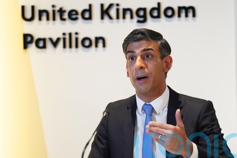 Sunak wraps up 11-hour Cop28 trip with new deal for UK wind farm