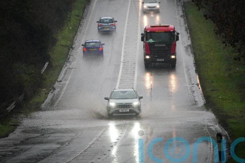 Train passengers face delays as heavy rain leads to flood warnings