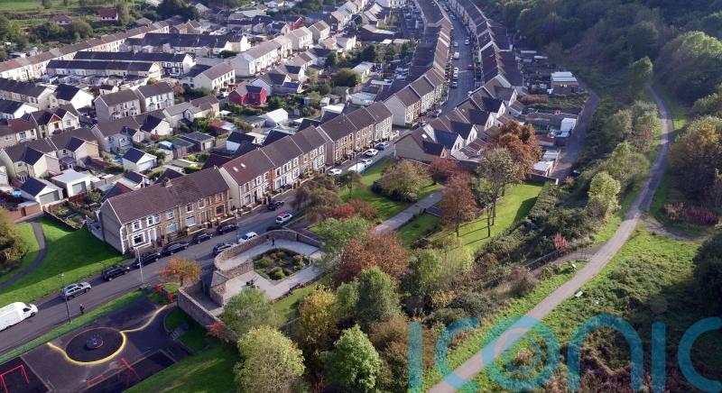 Armed police search for man after 29-year-old woman stabbed in village