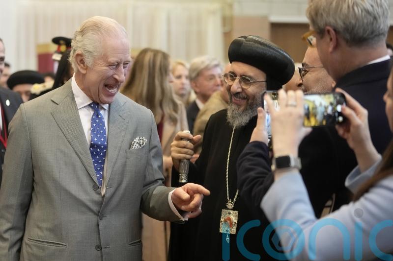 Charles given handwritten Christmas letter by six-year-old girl on church visit