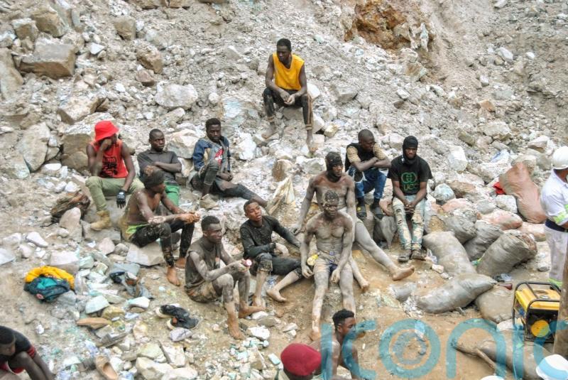 Rescuers recover bodies of 11 miners trapped by landslides after heavy rain