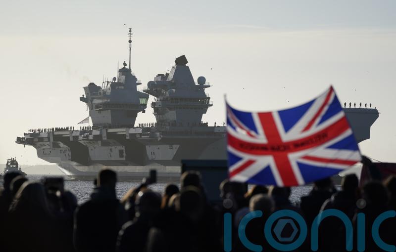 Families and friends welcome aircraft carrier HMS Prince of Wales home