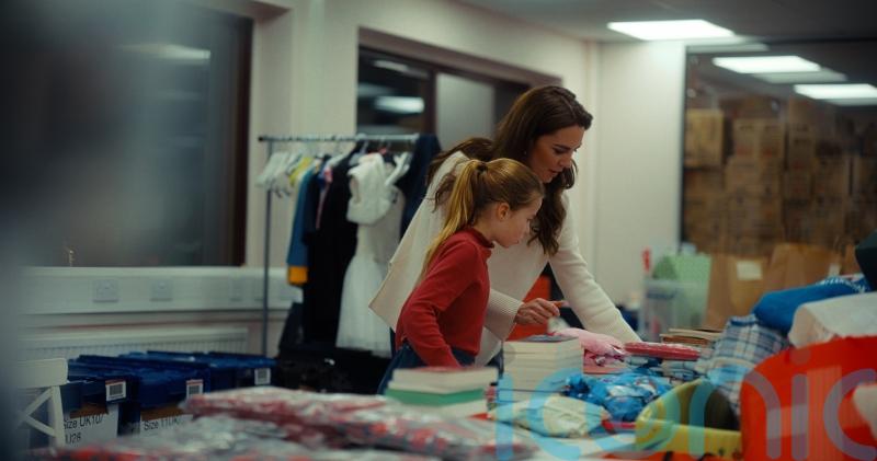 George, Charlotte and Louis join Kate to volunteer at baby bank charity