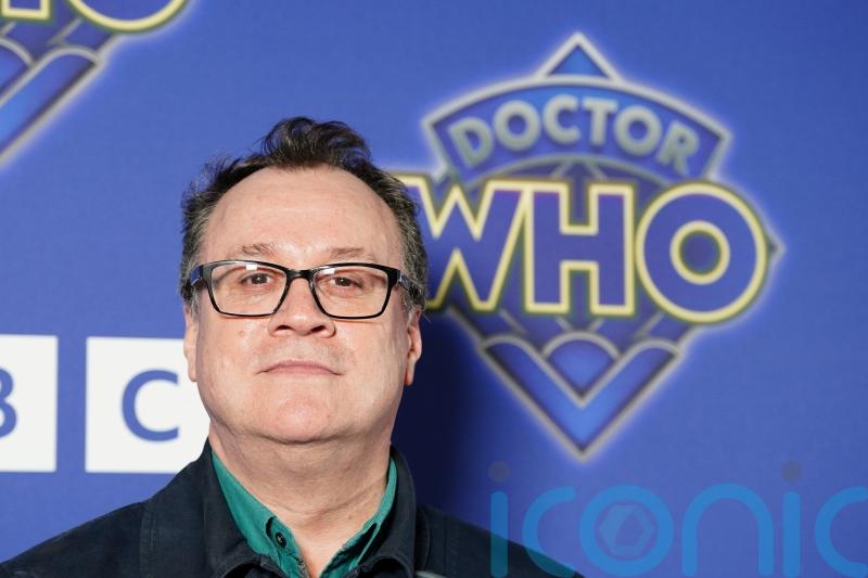 Russell T Davies determined to keep Doctor Who feel-good show in ‘tough world’