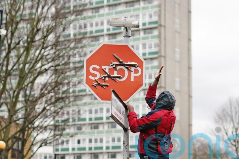 Police investigate after Banksy street artwork removed