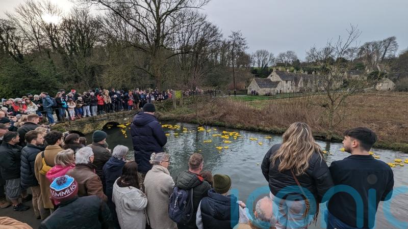 3,000 rubber ducks take to river in Cotswolds village for annual race
