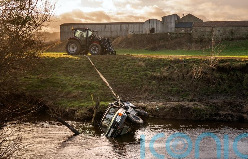 Vehicle in which three men were trapped removed from North Yorkshire river