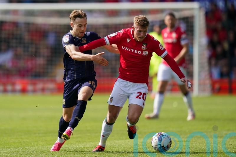 Swindon hold on to beat Forest Green after late penalty drama