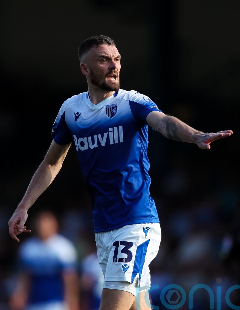 Gillingham return to winning ways as Scott Malone strike downs 10-man Sutton