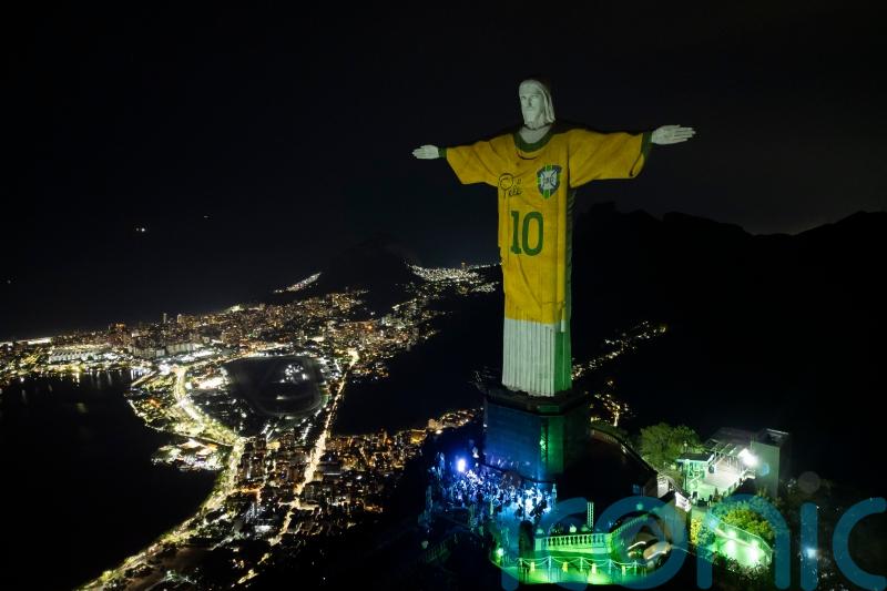 Christ the Redeemer statue illuminated with Brazil shirt as tribute to Pele