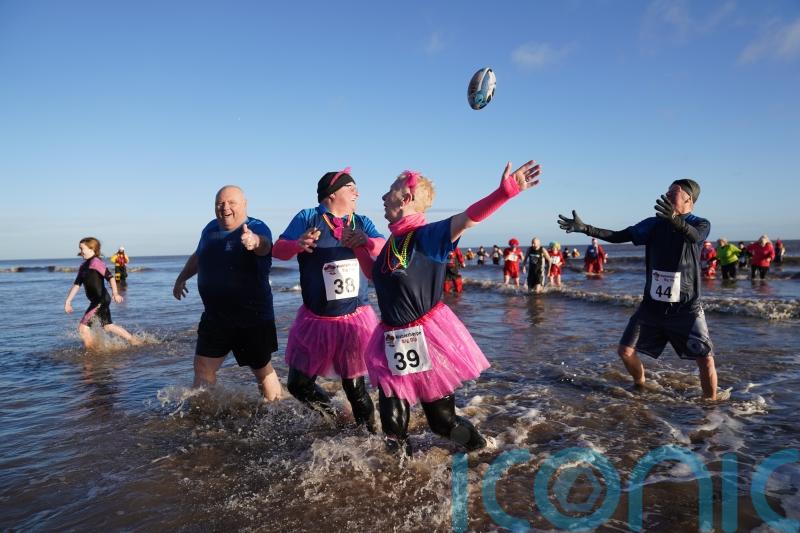 In Pictures: Revellers take the plunge with New Year&rsquo;s Day dip in icy waters