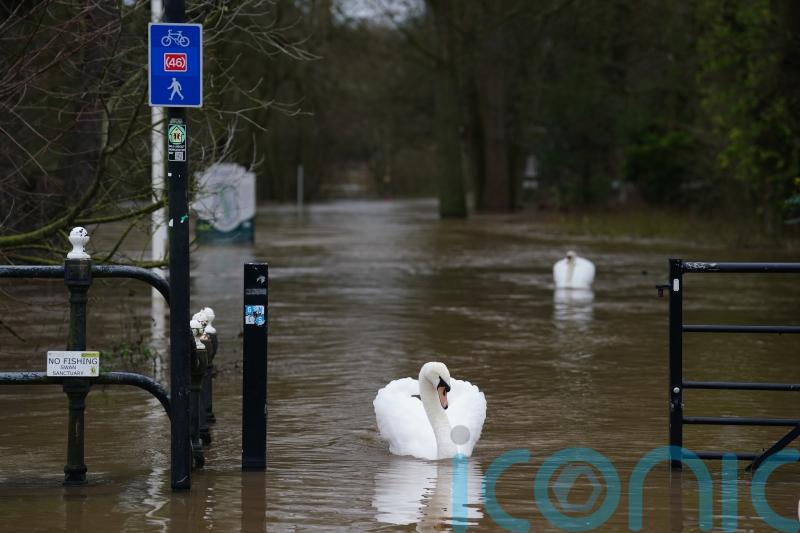 In Pictures: Residents braced for evacuation as heavy rainfall causes flooding