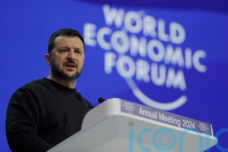 Zelensky lashes out at Putin and urges Davos forum’s support for Ukraine’s fight