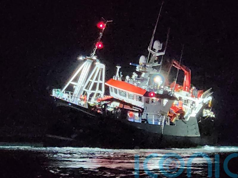 Rescue launched after trawler runs aground on rocks