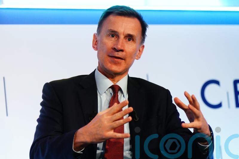 Hunt to tell Davos summit: Britain is on the up and open for business