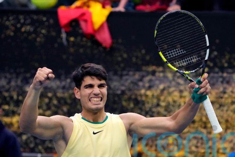 Carlos Alcaraz battles through on testing day for top names at Australian Open