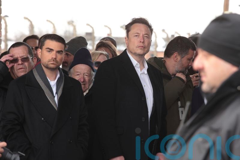 Elon Musk visits Auschwitz after uproar over antisemitic messages on X